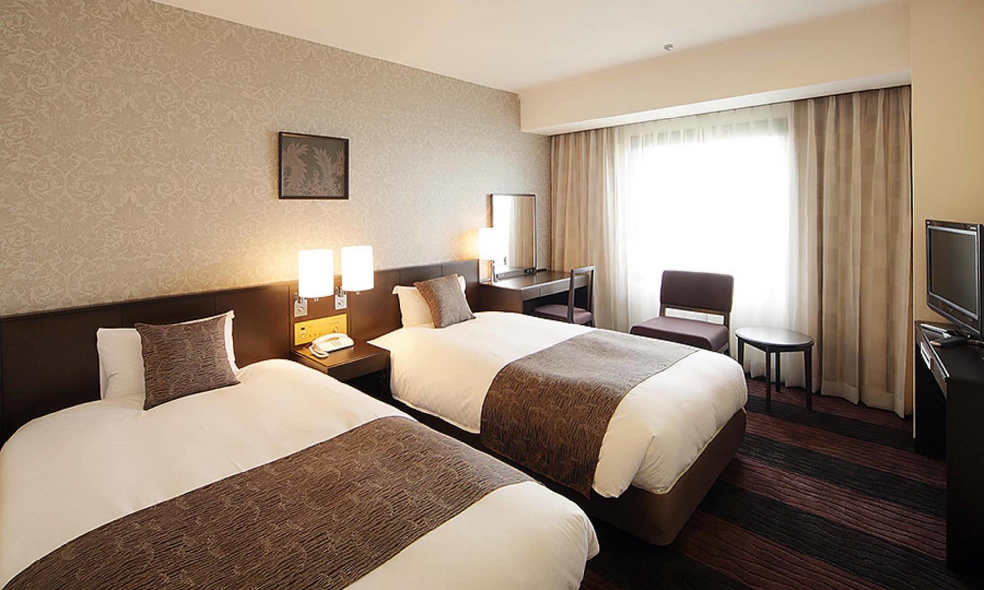 Hotel Granvia Wakayama Exterior foto A room at the hotel
