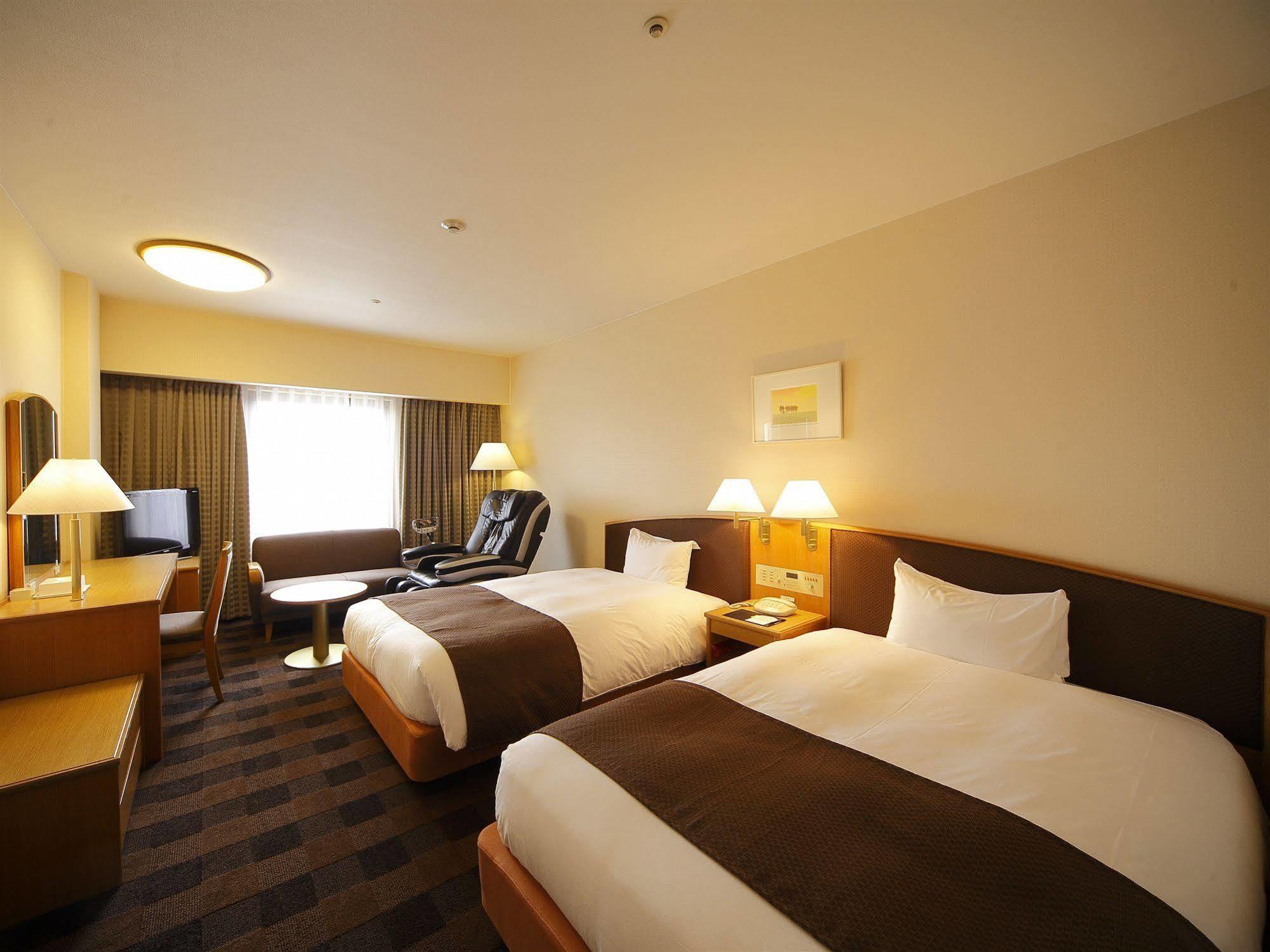 Hotel Granvia Wakayama Exterior foto A typical room at the hotel